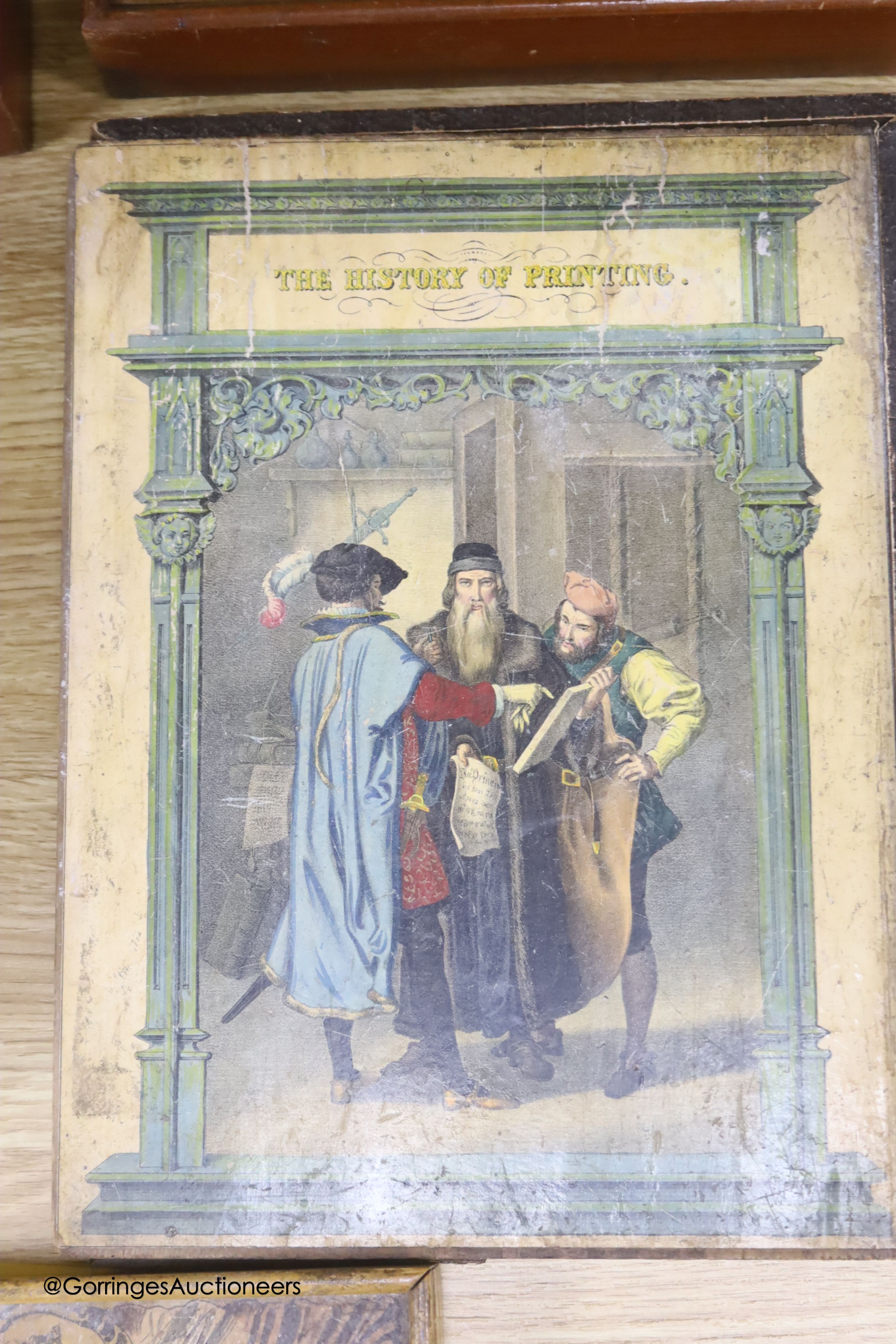 Five Edwardian boxed jigsaw puzzles, to include the history of printing, birds and their nests, biblical subjects, etc